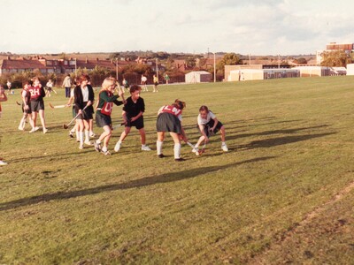 A Hockey match on the school field