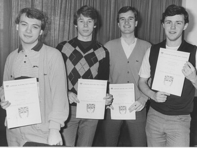 Presentation to four boys